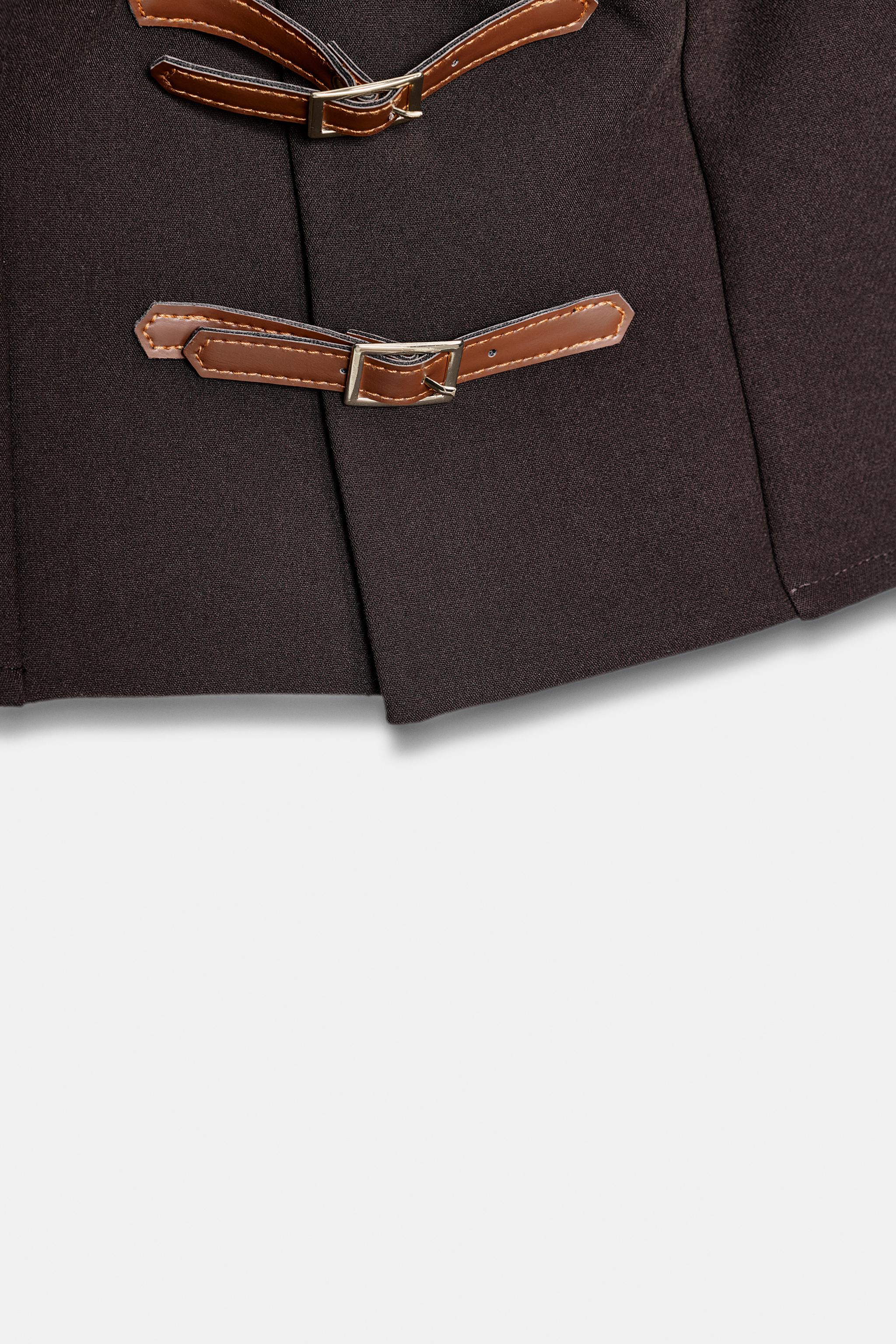 BUCKLE TAB TOP